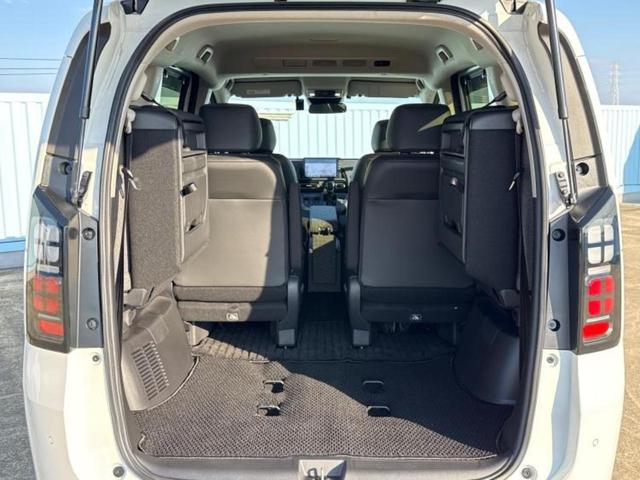 フリード ｅＨＥＶエアーＥＸ　新品タイヤ／純正　９インチ　メモリーナビ／ホンダセンシング／両側電動スライドドア／シートヒーター　前席／車線逸脱防止支援システム／パーキングアシスト　バックガイド／ヘッドランプ　ＬＥＤ　バックカメラ（21枚目）