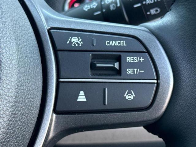 フリード ｅＨＥＶエアーＥＸ　新品タイヤ／純正　９インチ　メモリーナビ／ホンダセンシング／両側電動スライドドア／シートヒーター　前席／車線逸脱防止支援システム／パーキングアシスト　バックガイド／ヘッドランプ　ＬＥＤ　バックカメラ（28枚目）