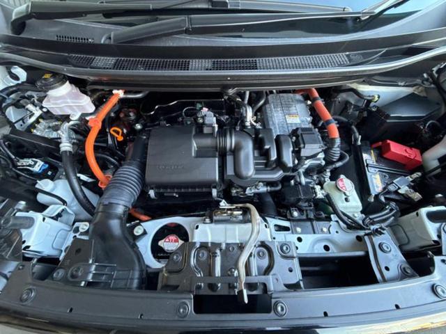 フリード ｅＨＥＶエアーＥＸ　新品タイヤ／純正　９インチ　メモリーナビ／ホンダセンシング／両側電動スライドドア／シートヒーター　前席／車線逸脱防止支援システム／パーキングアシスト　バックガイド／ヘッドランプ　ＬＥＤ　バックカメラ（50枚目）