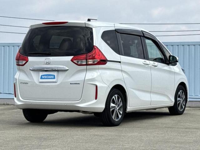 フリードハイブリッド ハイブリッドＧ　新品タイヤ／保証書／純正　１０インチ　ＳＤナビ／ホンダセンシング／両側電動スライドドア／シートヒーター　前席／車線逸脱防止支援システム／ヘッドランプ　ＬＥＤ／ＵＳＢジャック／Ｂｌｕｅｔｏｏｔｈ接続（3枚目）