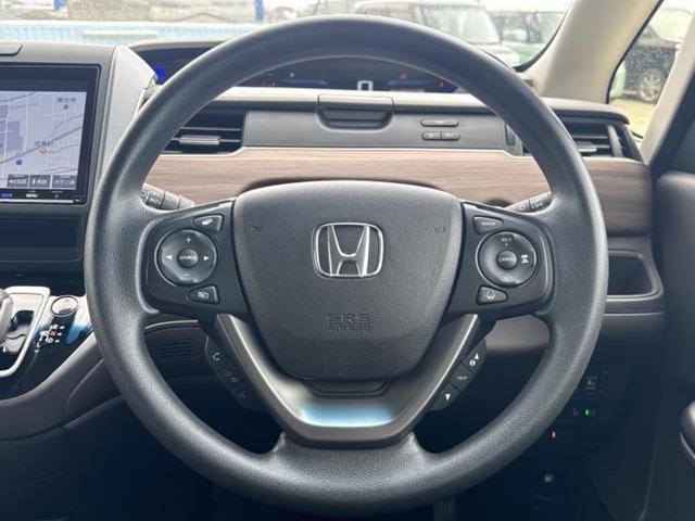 フリードハイブリッド ハイブリッドＧ　新品タイヤ／保証書／純正　１０インチ　ＳＤナビ／ホンダセンシング／両側電動スライドドア／シートヒーター　前席／車線逸脱防止支援システム／ドライブレコーダー　純正／ヘッドランプ　ＬＥＤ　バックカメラ（14枚目）