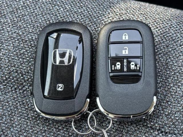 フリード eHEVエアー 保証書/純正 8インチ ナビ/ホンダセンシング/両側電動スライドドア/車線逸脱防止支援システム/登録済未使用車/ヘッドランプ LED/USBジャック/Bluetooth接続/EBD付ABS 禁煙車(33枚目)