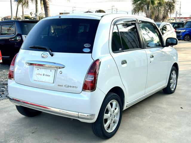 ミラジーノ プレミアムＬ　禁煙車　ＥＴＣ　ドライブレコーダー前後　木目調パネル　ＭＯＭＯステアリング　オーディオ　純正アルミホイール　ＣＤ　フォグランプ　キーレス（5枚目）