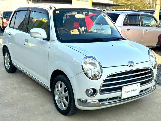 ミラジーノ プレミアムＬ　禁煙車　ＥＴＣ　ドライブレコーダー前後　木目調パネル　ＭＯＭＯステアリング　オーディオ　純正アルミホイール　ＣＤ　フォグランプ　キーレス（12枚目）