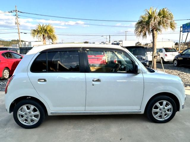 ミラジーノ プレミアムＬ　禁煙車　ＥＴＣ　ドライブレコーダー前後　木目調パネル　ＭＯＭＯステアリング　オーディオ　純正アルミホイール　ＣＤ　フォグランプ　キーレス（13枚目）