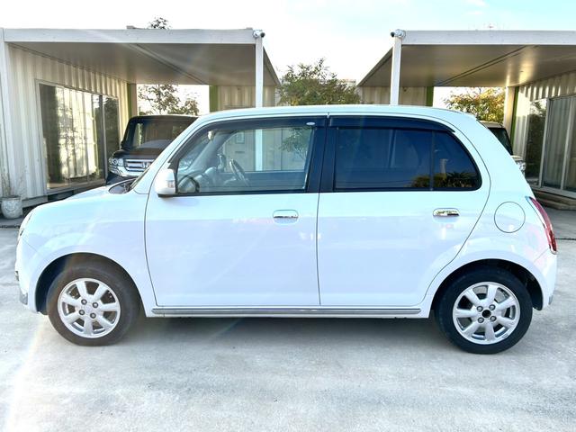 ミラジーノ プレミアムＬ　禁煙車　ＥＴＣ　ドライブレコーダー前後　木目調パネル　ＭＯＭＯステアリング　オーディオ　純正アルミホイール　ＣＤ　フォグランプ　キーレス（16枚目）