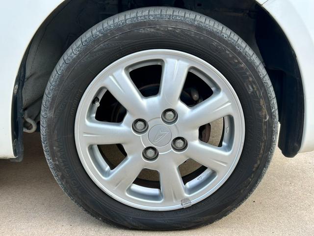 ミラジーノ プレミアムＬ　禁煙車　ＥＴＣ　ドライブレコーダー前後　木目調パネル　ＭＯＭＯステアリング　オーディオ　純正アルミホイール　ＣＤ　フォグランプ　キーレス（22枚目）