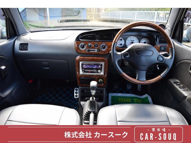 ミラジーノ ミニライトスペシャルターボ　５速ＭＴ・インタークーラーターボ・ターボタイマー付エンジンスターター・社外ブーストメーター・純正ミニライト１４インチＡＷ・ウッドコンビハンドル・シートカバー・リア修復有り（2枚目）