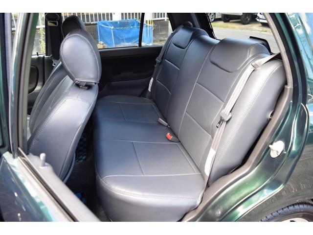 ミラジーノ ミニライトスペシャルターボ　５速ＭＴ・インタークーラーターボ・ターボタイマー付エンジンスターター・社外ブーストメーター・純正ミニライト１４インチＡＷ・ウッドコンビハンドル・シートカバー・リア修復有り（22枚目）