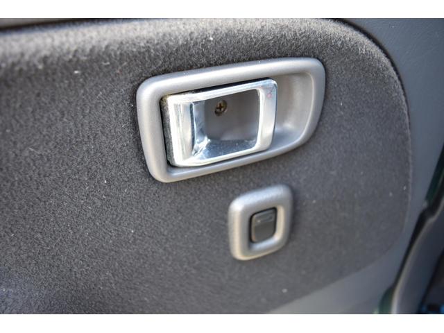 ミラジーノ ミニライトスペシャルターボ　５速ＭＴ・インタークーラーターボ・ターボタイマー付エンジンスターター・社外ブーストメーター・純正ミニライト１４インチＡＷ・ウッドコンビハンドル・シートカバー・リア修復有り（24枚目）