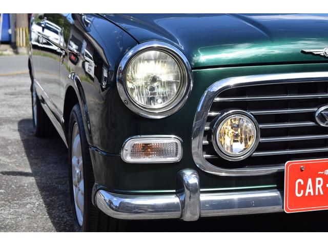 ミラジーノ ミニライトスペシャルターボ　５速ＭＴ・インタークーラーターボ・ターボタイマー付エンジンスターター・社外ブーストメーター・純正ミニライト１４インチＡＷ・ウッドコンビハンドル・シートカバー・リア修復有り（30枚目）