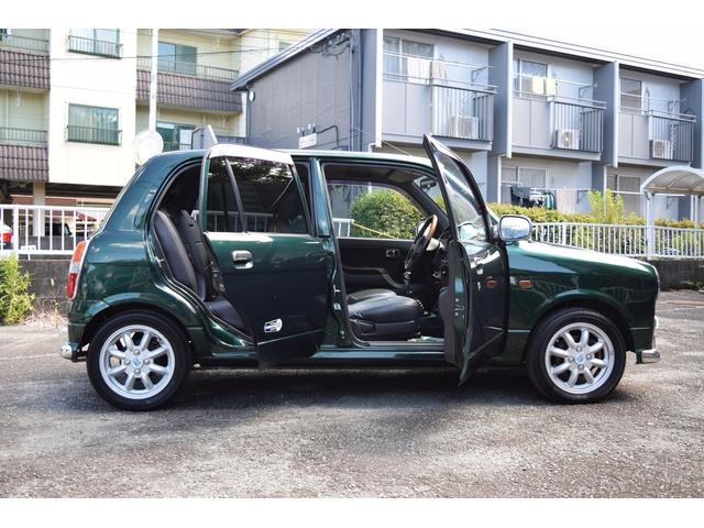 ミラジーノ ミニライトスペシャルターボ　５速ＭＴ・インタークーラーターボ・ターボタイマー付エンジンスターター・社外ブーストメーター・純正ミニライト１４インチＡＷ・ウッドコンビハンドル・シートカバー・リア修復有り（33枚目）