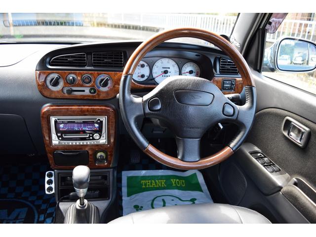 ミラジーノ ミニライトスペシャルターボ　５速ＭＴ・インタークーラーターボ・ターボタイマー付エンジンスターター・社外ブーストメーター・純正ミニライト１４インチＡＷ・ウッドコンビハンドル・シートカバー・リア修復有り（37枚目）