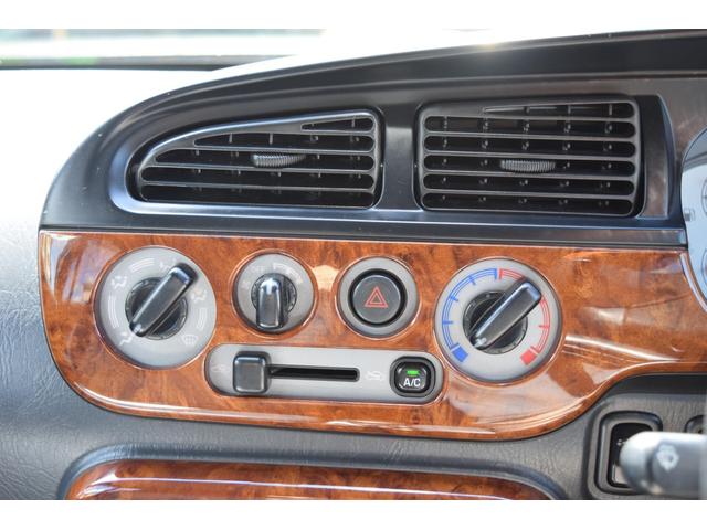 ミラジーノ ミニライトスペシャルターボ　５速ＭＴ・インタークーラーターボ・ターボタイマー付エンジンスターター・社外ブーストメーター・純正ミニライト１４インチＡＷ・ウッドコンビハンドル・シートカバー・リア修復有り（42枚目）