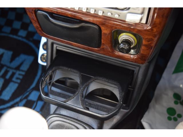 ミラジーノ ミニライトスペシャルターボ　５速ＭＴ・インタークーラーターボ・ターボタイマー付エンジンスターター・社外ブーストメーター・純正ミニライト１４インチＡＷ・ウッドコンビハンドル・シートカバー・リア修復有り（44枚目）