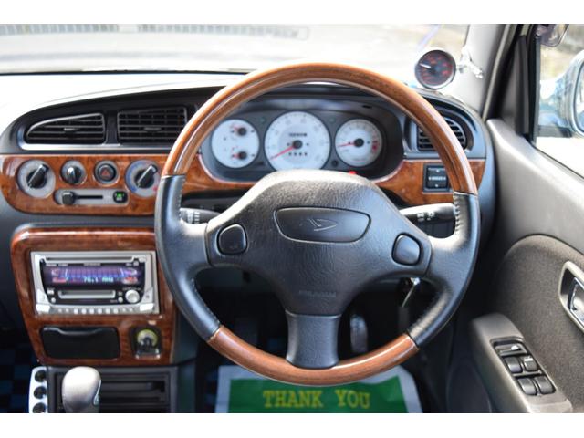 ミラジーノ ミニライトスペシャルターボ　５速ＭＴ・インタークーラーターボ・ターボタイマー付エンジンスターター・社外ブーストメーター・純正ミニライト１４インチＡＷ・ウッドコンビハンドル・シートカバー・リア修復有り（48枚目）