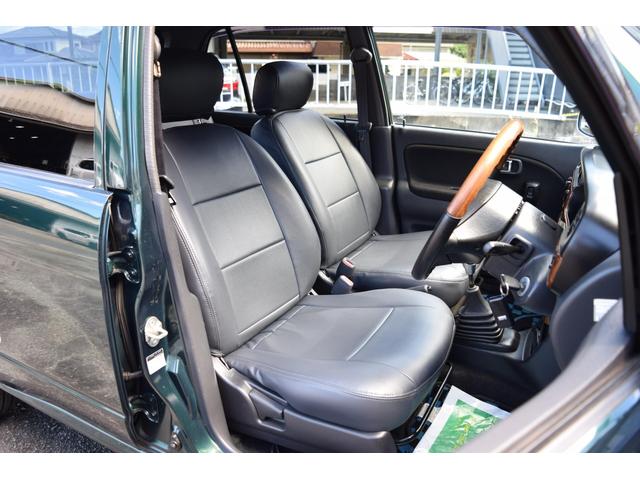 ミラジーノ ミニライトスペシャルターボ　５速ＭＴ・インタークーラーターボ・ターボタイマー付エンジンスターター・社外ブーストメーター・純正ミニライト１４インチＡＷ・ウッドコンビハンドル・シートカバー・リア修復有り（50枚目）