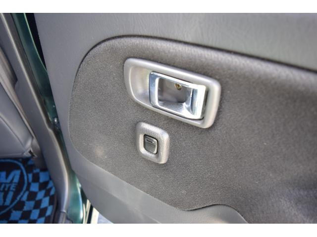 ミラジーノ ミニライトスペシャルターボ　５速ＭＴ・インタークーラーターボ・ターボタイマー付エンジンスターター・社外ブーストメーター・純正ミニライト１４インチＡＷ・ウッドコンビハンドル・シートカバー・リア修復有り（56枚目）