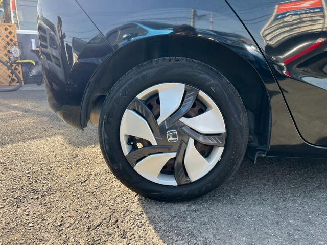 フィットハイブリッド Ｌパッケージ　評価書付　純正ナビ　地デジ　ＣＤ／ＤＶＤ　Ｂｌｕｅｔｏｏｔｈ　バックカメラ　ＥＴＣ　ハーフレザー　クルコン　３６０°ドラレコ　スマートキー　オートライト（20枚目）