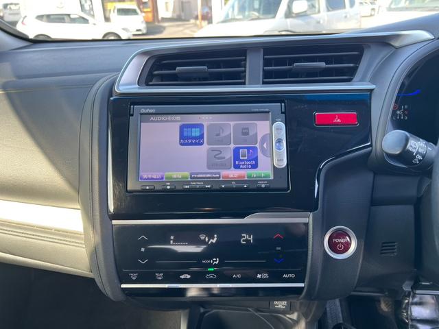 フィットハイブリッド Ｌパッケージ　評価書付　純正ナビ　地デジ　ＣＤ／ＤＶＤ　Ｂｌｕｅｔｏｏｔｈ　バックカメラ　ＥＴＣ　ハーフレザー　クルコン　３６０°ドラレコ　スマートキー　オートライト（34枚目）