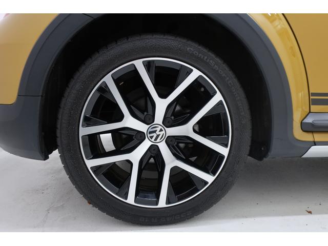 ザ・ビートル デューン　５００台限定特別仕様車　純正ナビＴＶ　バックカメラ　ＨＩＤヘッドランプ　スマートキー　禁煙車　記録簿　パークディスタンスコントロール　クルーズコントロール　リアスポイラー　１８インチ純正ホイール（65枚目）