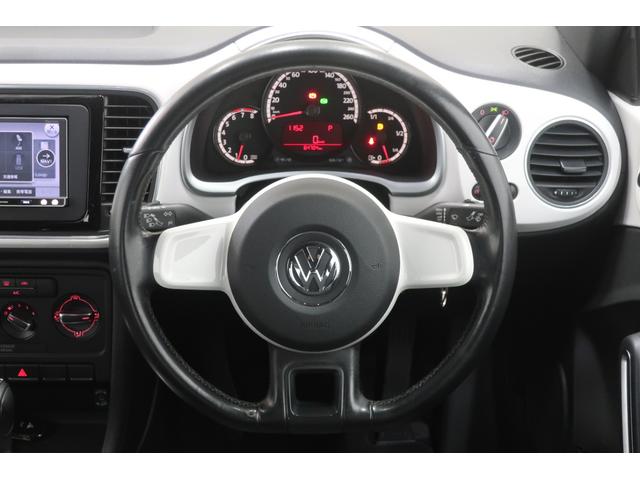 ザ・ビートル デザイン　社外ナビＴＶ　ＥＴＣ　ＨＩＤヘッドランプ　１６インチ純正ホイール　Ｂｌｕｅｔｏｏｔｈオーディオ　フォグランプ　革巻きステアリング　８スピーカー　記録簿　禁煙車（13枚目）