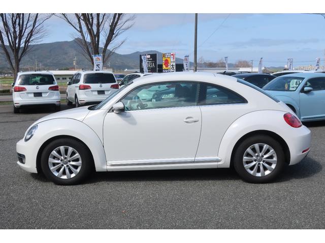 ザ・ビートル デザイン　社外ナビＴＶ　ＥＴＣ　ＨＩＤヘッドランプ　１６インチ純正ホイール　Ｂｌｕｅｔｏｏｔｈオーディオ　フォグランプ　革巻きステアリング　８スピーカー　記録簿　禁煙車（72枚目）