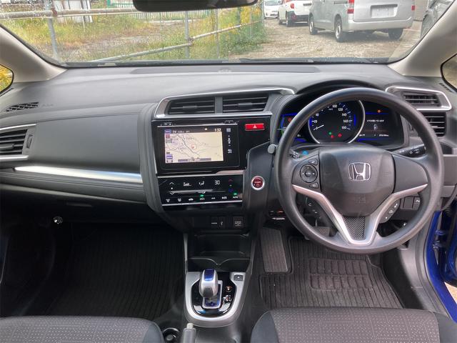 フィットハイブリッド Fパッケージ ハイブリッド ETC バックカメラ ナビ TV クリアランスソナー スマートキー 電動格納ミラー AT 盗難防止システム 衝突安全ボディ CD USB Bluetooth ABS ESC エアコン(2枚目)