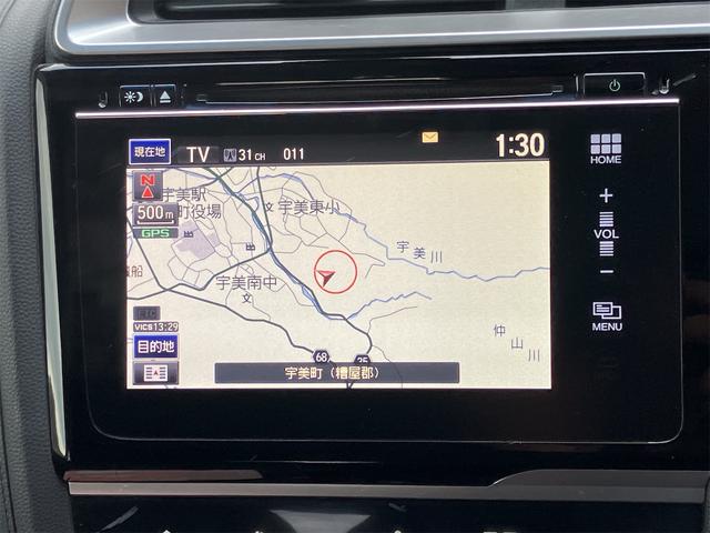 フィットハイブリッド Fパッケージ ハイブリッド ETC バックカメラ ナビ TV クリアランスソナー スマートキー 電動格納ミラー AT 盗難防止システム 衝突安全ボディ CD USB Bluetooth ABS ESC エアコン(4枚目)