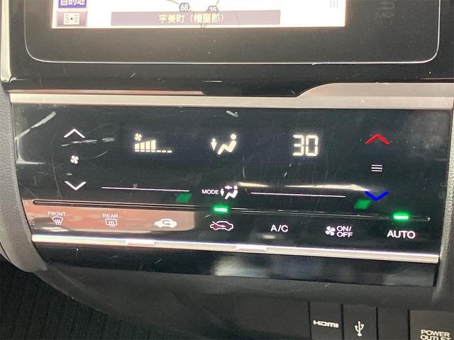 フィットハイブリッド Fパッケージ ハイブリッド ETC バックカメラ ナビ TV クリアランスソナー スマートキー 電動格納ミラー AT 盗難防止システム 衝突安全ボディ CD USB Bluetooth ABS ESC エアコン(6枚目)