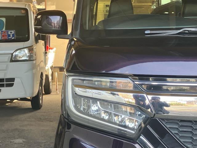 N-BOXカスタム G・Lホンダセンシング 後席モニター ドライブレコーダー ETC メモリーナビ バックカメラ DVD CD Bluetoothオーディオ 左側パワースライドドア レザーシートカバー オートライト オートマティックハイビーム(4枚目)