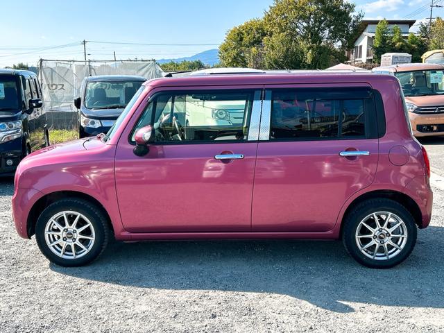 アルトラパン 10thアニバーサリーリミテッド オートライト スマートキー 電動格納ミラー シートヒーター ベンチシート CVT 盗難防止システム ABS CD アルミホイール 衝突安全ボディ エアコン パワーステアリング パワーウィンドウ(14枚目)