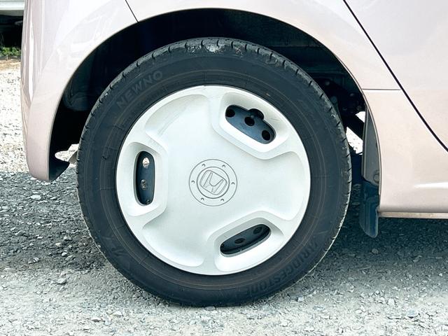 Ｎ－ＯＮＥ Ｇ・Ｌパッケージ　オートライト　ＨＩＤ　スマートキー　アイドリングストップ　電動格納ミラー　ベンチシート　ＣＶＴ　盗難防止システム　ＡＢＳ　ＥＳＣ　ＣＤ　衝突安全ボディ　エアコン　パワーステアリング　パワーウィンドウ（33枚目）