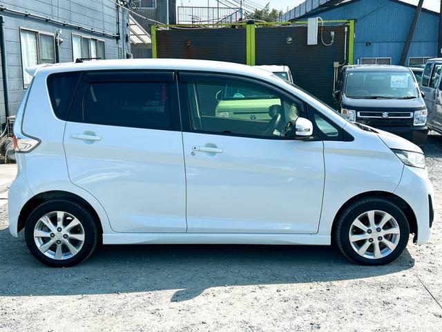 ｅＫカスタム Ｇ　バックカメラ　ナビ　ＴＶ　ＨＩＤ　スマートキー　アイドリングストップ　電動格納ミラー　ベンチシート　ＣＶＴ　盗難防止システム　ＡＢＳ　ＣＤ　ＤＶＤ再生　ＵＳＢ　ミュージックプレイヤー接続可（14枚目）