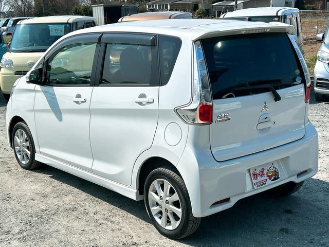 ｅＫカスタム Ｇ　バックカメラ　ナビ　ＴＶ　ＨＩＤ　スマートキー　アイドリングストップ　電動格納ミラー　ベンチシート　ＣＶＴ　盗難防止システム　ＡＢＳ　ＣＤ　ＤＶＤ再生　ＵＳＢ　ミュージックプレイヤー接続可（23枚目）