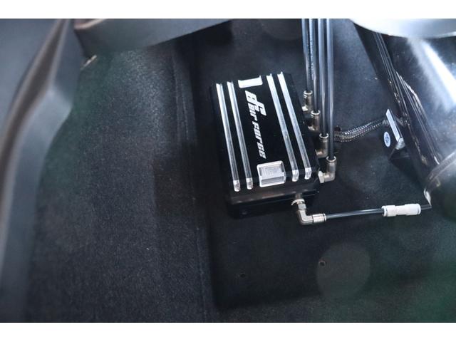 アルファードハイブリッド エグゼクティブラウンジＳ　モデリスタエアロ　外品エアサス　２１インチＡＷ　ＪＢＬサウンド　サンルーフ　デジタルインナーミラー　フリップダウンモニター　パノラミックビューモニター　両側パワースライドドア　電動ステップ（9枚目）