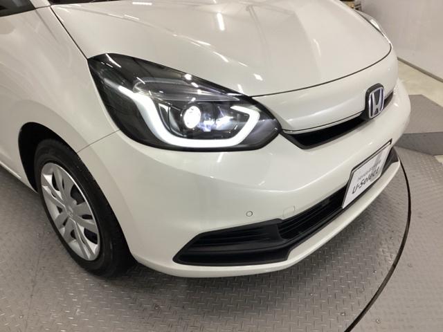 フィット e:HEVホーム メモリーナビ ETC リアカメラ 前後誤発進抑制機能 クリソナ 助手席エアバッグ 運転席エアバッグ アイドリングストップ LEDライト USB接続 バックカメラ ABS サイドエアバッグ フルセグTV(20枚目)