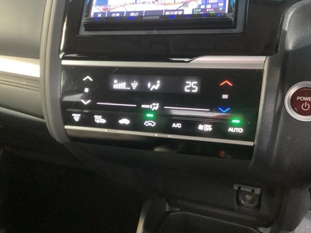 フィットハイブリッド Ｌパッケージ　ナビ　フルセグ　あんしんパッケージ　サイドエアバック　ＬＥＤ　ＥＣＯＮ　バックカメラ　オートクルーズコントロール　イモビライザー　ＥＴＣ　ＥＳＣ　ＡＵＴＯエアコン　ＡＢＳ　運転席助手席エアバッグ（13枚目）
