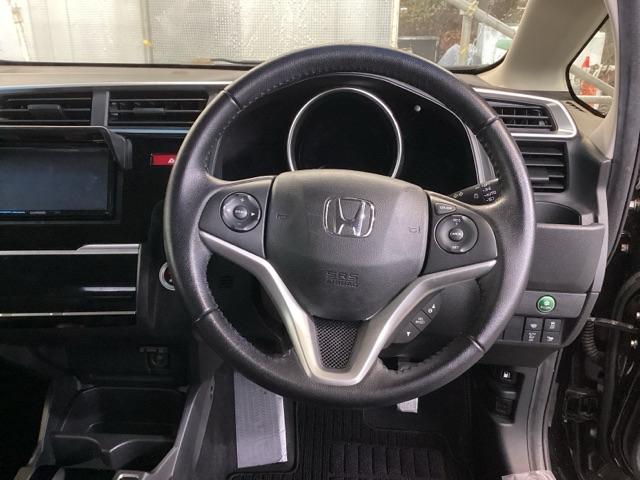 フィットハイブリッド Ｌパッケージ　ナビ　フルセグ　あんしんパッケージ　サイドエアバック　ＬＥＤ　ＥＣＯＮ　バックカメラ　オートクルーズコントロール　イモビライザー　ＥＴＣ　ＥＳＣ　ＡＵＴＯエアコン　ＡＢＳ　運転席助手席エアバッグ（18枚目）