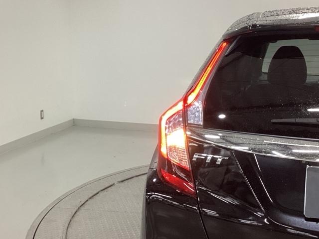 フィットハイブリッド Ｌパッケージ　ナビ　フルセグ　あんしんパッケージ　サイドエアバック　ＬＥＤ　ＥＣＯＮ　バックカメラ　オートクルーズコントロール　イモビライザー　ＥＴＣ　ＥＳＣ　ＡＵＴＯエアコン　ＡＢＳ　運転席助手席エアバッグ（34枚目）