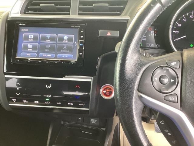 フィットハイブリッド Ｌホンダセンシング　純正ナビ　フルセグ　リアカメラ　軽減ブレーキ　Ｒカメ　ＬＥＤ　サイドＳＲＳ　横滑り防止　ドライブレコーダー　ナビＴＶ　パワーステアリング　盗難防止装置　オートクルーズ　ＥＴＣ車載器　ＤＶＤ再生　ＡＢＳ（2枚目）