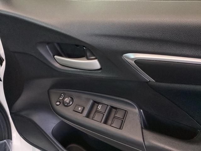 フィット １３Ｇ・Ｌパッケージ　ナビ　フルセグ　リアカメラ　盗難警報装置　Ｂカメ　Ｓキー　フルオートエアコン　リモコンキー　横滑り防止機能　エアバック　アイスト　ＥＴＣ付き　パワーウィンド　Ｗエアバッグ　ＬＥＤヘッドランプ　ＡＢＳ（49枚目）