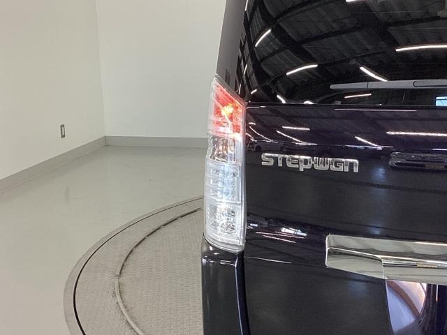 ステップワゴンスパーダ Z ナビ 両側電動スライドドア リアカメラ 横滑防止 エアロ イモビ スマキー バックモニタ- キーフリー パワーウィンド ETC付 ワンセグ エアコン 運転席助手席エアバック エアバック ABS PS(35枚目)