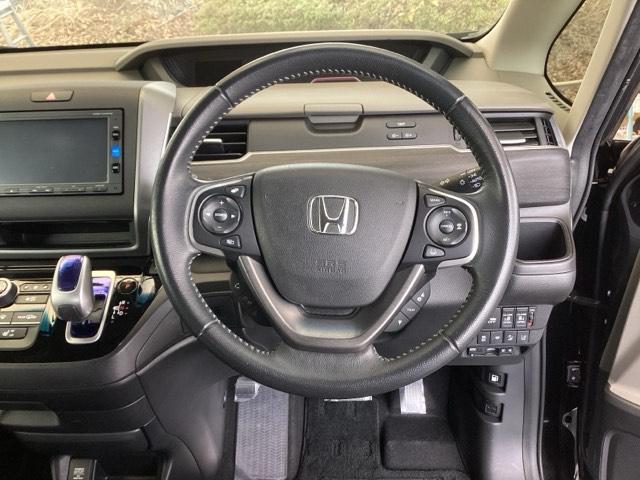 フリードハイブリッド ハイブリッド・Gホンダセンシング 純正ナビ フルセグ 4WD仕様 スマキー 衝突軽減システム イモビライザー シートH ETC車載器 クルコン VSA サイドカーテンエアバック ウォークスルー ナビTV キーフリー ABS DVD(18枚目)