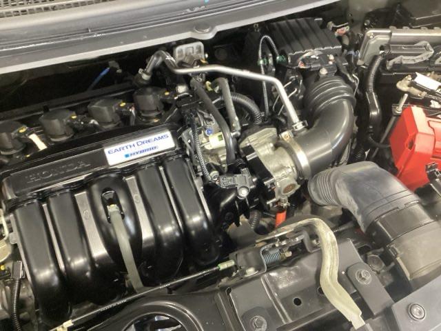 フリードハイブリッド ハイブリッド・Gホンダセンシング 純正ナビ フルセグ 4WD仕様 スマキー 衝突軽減システム イモビライザー シートH ETC車載器 クルコン VSA サイドカーテンエアバック ウォークスルー ナビTV キーフリー ABS DVD(24枚目)