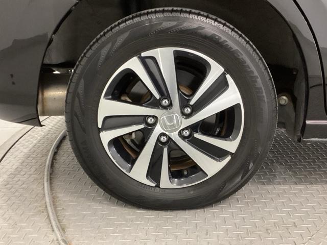 フリードハイブリッド ハイブリッド・Gホンダセンシング 純正ナビ フルセグ 4WD仕様 スマキー 衝突軽減システム イモビライザー シートH ETC車載器 クルコン VSA サイドカーテンエアバック ウォークスルー ナビTV キーフリー ABS DVD(26枚目)