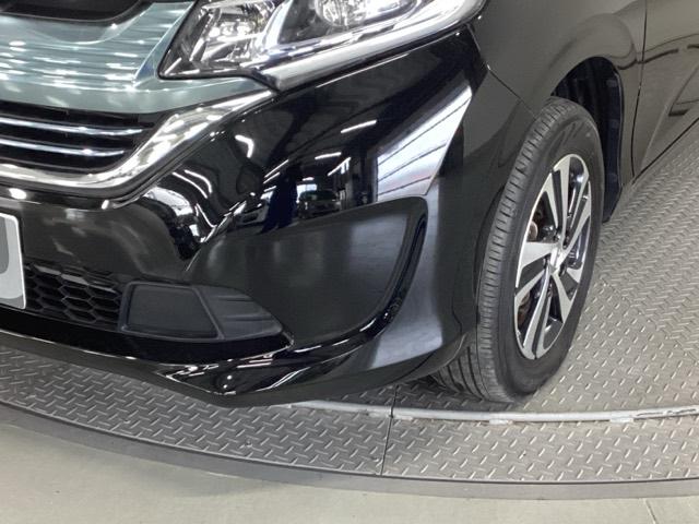 フリードハイブリッド ハイブリッド・Gホンダセンシング 純正ナビ フルセグ 4WD仕様 スマキー 衝突軽減システム イモビライザー シートH ETC車載器 クルコン VSA サイドカーテンエアバック ウォークスルー ナビTV キーフリー ABS DVD(29枚目)