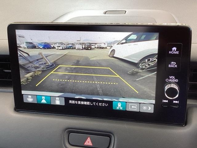 ヴェゼル ｅ：ＨＥＶＺ　純正メモリーナビ　ドラレコ　リアカメラ　Ｓヒータ　地デジフルセグＴＶ　定期点検記録簿　電動テールゲート　サイドエアバッグ　後カメラ　前後障害物センサー　横滑防止装置　エアコン　ＬＥＤヘットライト（12枚目）