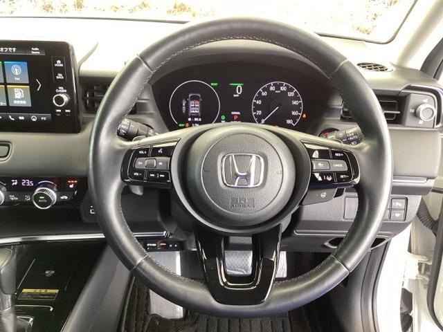 ヴェゼル ｅ：ＨＥＶＺ　純正メモリーナビ　ドラレコ　リアカメラ　Ｓヒータ　地デジフルセグＴＶ　定期点検記録簿　電動テールゲート　サイドエアバッグ　後カメラ　前後障害物センサー　横滑防止装置　エアコン　ＬＥＤヘットライト（14枚目）