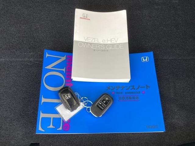 ヴェゼル ｅ：ＨＥＶＺ　純正メモリーナビ　ドラレコ　リアカメラ　Ｓヒータ　地デジフルセグＴＶ　定期点検記録簿　電動テールゲート　サイドエアバッグ　後カメラ　前後障害物センサー　横滑防止装置　エアコン　ＬＥＤヘットライト（19枚目）